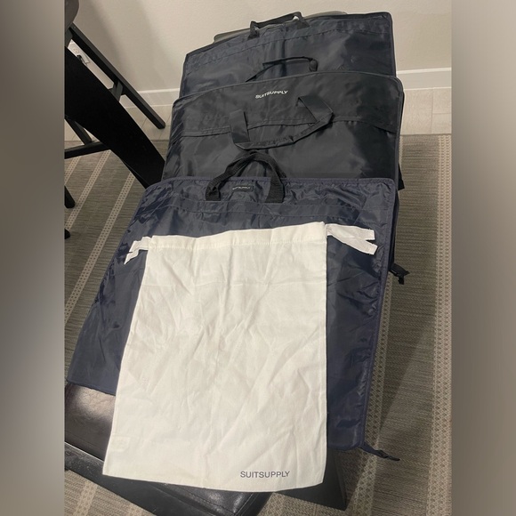 Lot of 3 Suitsupply foldable garment bags and 1 double sided shoe bag
